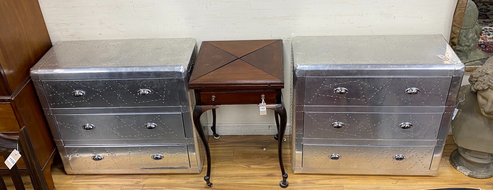 A pair of aeronautical style aluminium three drawer chests, width 90cm
